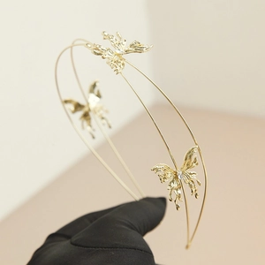 Barokke dubbellaagse gouden vlinder haarband met fonkelende zirkonia kristal details