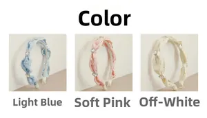 Details von gerafften Stoff-Stirnbändern mit Strasssteinen in Blau, Rosa und Beige