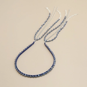 Handmade beaded headband featuring blue gradient crystals and long metallic fringe tassels