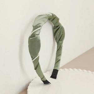 Elegant sage green satin headband with white pearl chain detail and non-slip ends