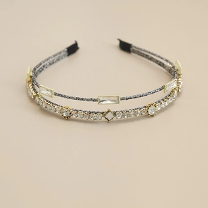 Detail of French style double-layer crystal headband with gold beads and sparkling rhinestones