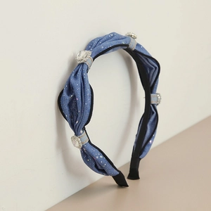 Blue denim headband with heart-shaped rhinestones and black piping for a retro French style