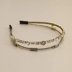 Detail of French style double-row crystal headband with vintage sunburst rhinestones