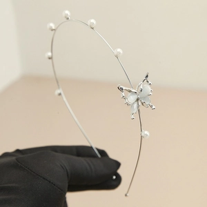 Elegant thin silver metal headband with butterfly design and small white pearls