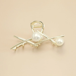 Elegant gold metal hair claw clip with faux pearls for women in minimalist Korean design