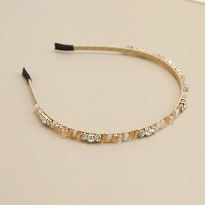 Serre-tête élégant en perles de cristal champagne et strass brillants aux tons dorés