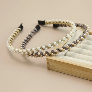 Elegant handmade pearl headbands in white and champagne with woven metal base design