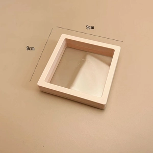 Transparent PE film jewelry box detail showing 9cm dimensions and pink plastic frame