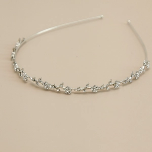 Silver flower headband with white rhinestones and vine design for wedding hair