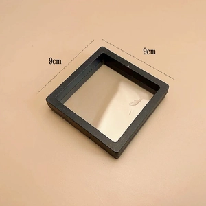 Detail of 9cm square black PE film suspension jewelry box showing dimensions and frame