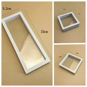 Three sizes of PE film floating jewelry display boxes in white frame for collectors