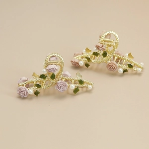Elegant gold metal hair claw clips with pink resin roses and pearls for women