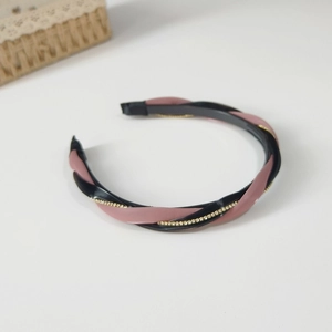 Detail of twisted leather headband with rhinestones and non-slip inner teeth design