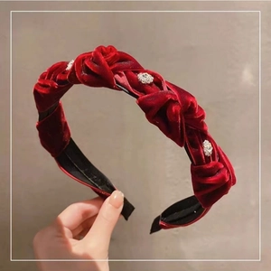 Elegant twisted red velvet headband with sparkling rhinestones for high-top hair styling