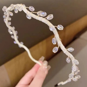 Minimalist hand-woven crystal headband with white satin wrap and faceted beads