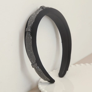 Elegant wide black headband with sparkling grey rhinestones and twisted knot design