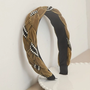 Vintage velvet braided headband with pearls and gold thread detail for a chic hair look