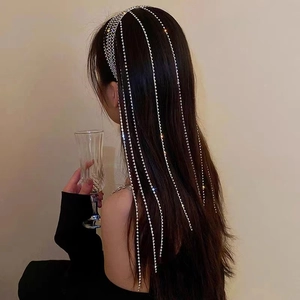 Elegant multi-layer silver headband with long rhinestone tassels for party and event styling