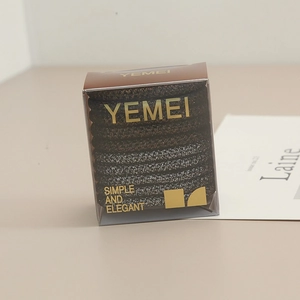 Détail de l'ensemble d'élastiques à cheveux haute élasticité dans un coffret élégant et sobre