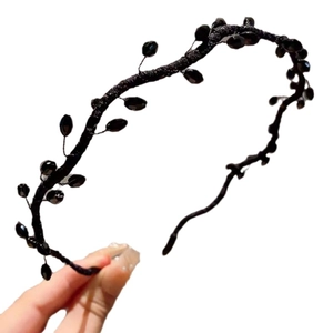 Elegant black crystal beaded thin headband with handcrafted vine design on white background
