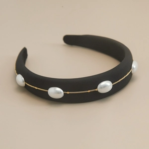 Detail of French vintage black sponge headband with white pearls and gold chain