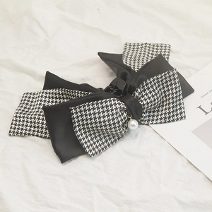Houndstooth and black satin layered bow hair claw clip with a delicate pearl pendant