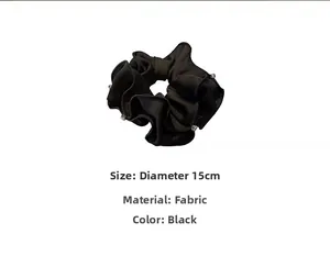 Detail shot of a 15cm black satin hair scrunchie with sparkling rhinestone edging