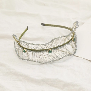 Luxurious beaded wavy headband with vintage green crystals and gold mesh weaving