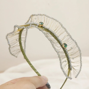 Handmade emerald crystal beaded headband with gold wire mesh and wave pattern design