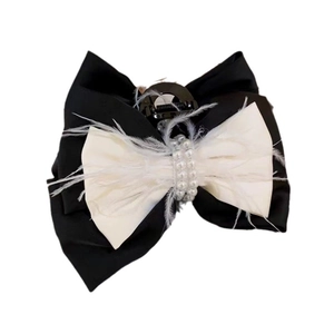 Elegant bow hair claw clip with black satin, white feathers and pearls in French style