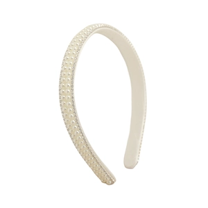 Elegant white pearl and crystal headband with rows of shimmering rhinestones on a smooth base