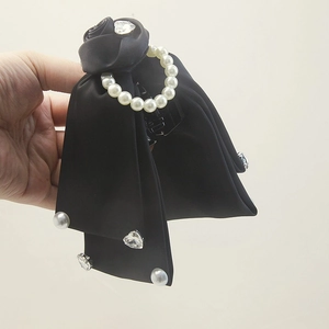 Elegant satin bow hair claw clip with black rose flower and pearls for women