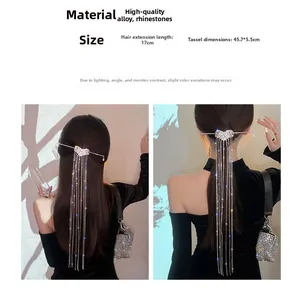 Detailed view of the 17cm alloy hair stick with long 45.7cm rhinestone heart tassels