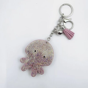 Sparkling crystal octopus keychain with colorful rhinestones and pink fringe tassel