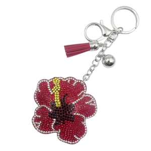 Kristallblumen Schlüsselanhänger mit bunten Strasssteinen, roter Quaste und Silberglocke