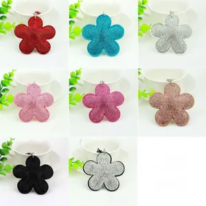Sparkly multi-colored rhinestone flower keychain charms in eight assorted vibrant finishes