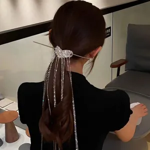 Elegant long tassel heart hair pin with sparkling rhinestones and a silver-toned metal finish