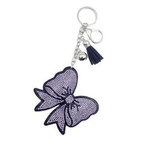 Porte-clés nœud en cristaux violets étincelants avec fermoir argenté et pompon en cuir