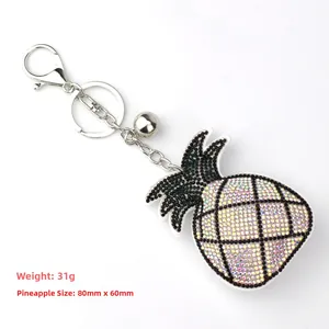 Detail view of rhinestone pineapple keychain with dimensions 80x60mm and 31g weight