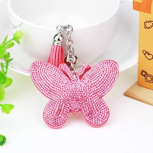 Pink rhinestone butterfly keychain with leather tassel and silver link chain accessory