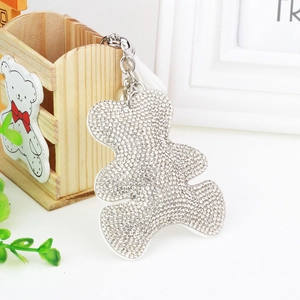 Detail of bear keychain featuring sparkling white rhinestones on silver metal ring