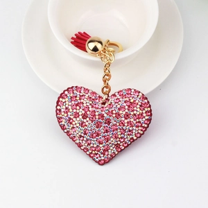 Sparkling pink rhinestone heart keychain with red tassel and gold metal ring for bags