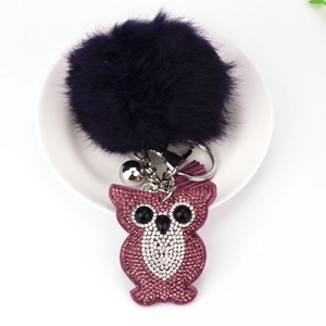 Purple faux fur pompom owl keychain with sparkling rhinestones and pink leather tassel