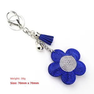 Portachiavi girasole con strass blu e nappina in pelle scamosciata dettagli di dimensioni