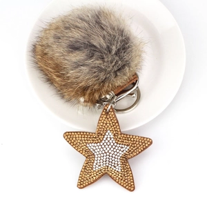 Porte-clés étoile en fausse fourrure avec strass étincelants et fermoir métallique