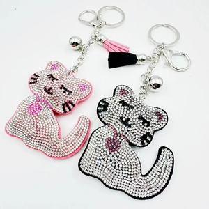 Porte-clés Chat Assis en Strass Mignon Mode Alliage Cristal Bijou de Sac Avec Gland en Cuir et Clochette pour Cadeau Bijoux Femme