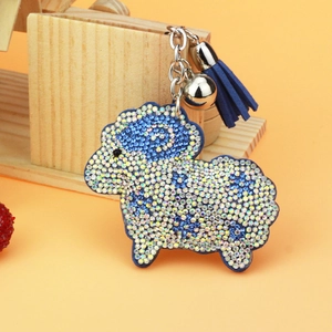 Portachiavi a pecora blu con strass, campanello d'argento e nappa in pelle blu