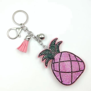 Sparkling pink rhinestone pineapple keychain with leather tassel and silver hardware