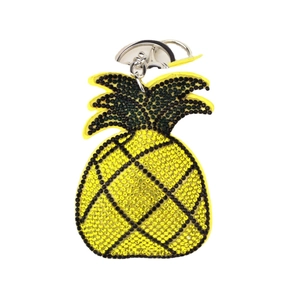 Sparkling pineapple rhinestone keychain with yellow body and black leaves in metal clip