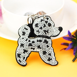 Porte-clés caniche scintillant avec strass noirs et blancs et pompon en velours